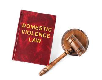 Image of Domestic violence law book and wooden gavel on white background, top view