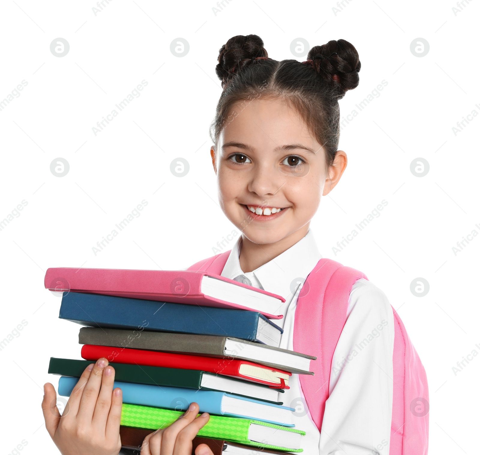 Photo of Happy girl in school uniform with stack of books on white background