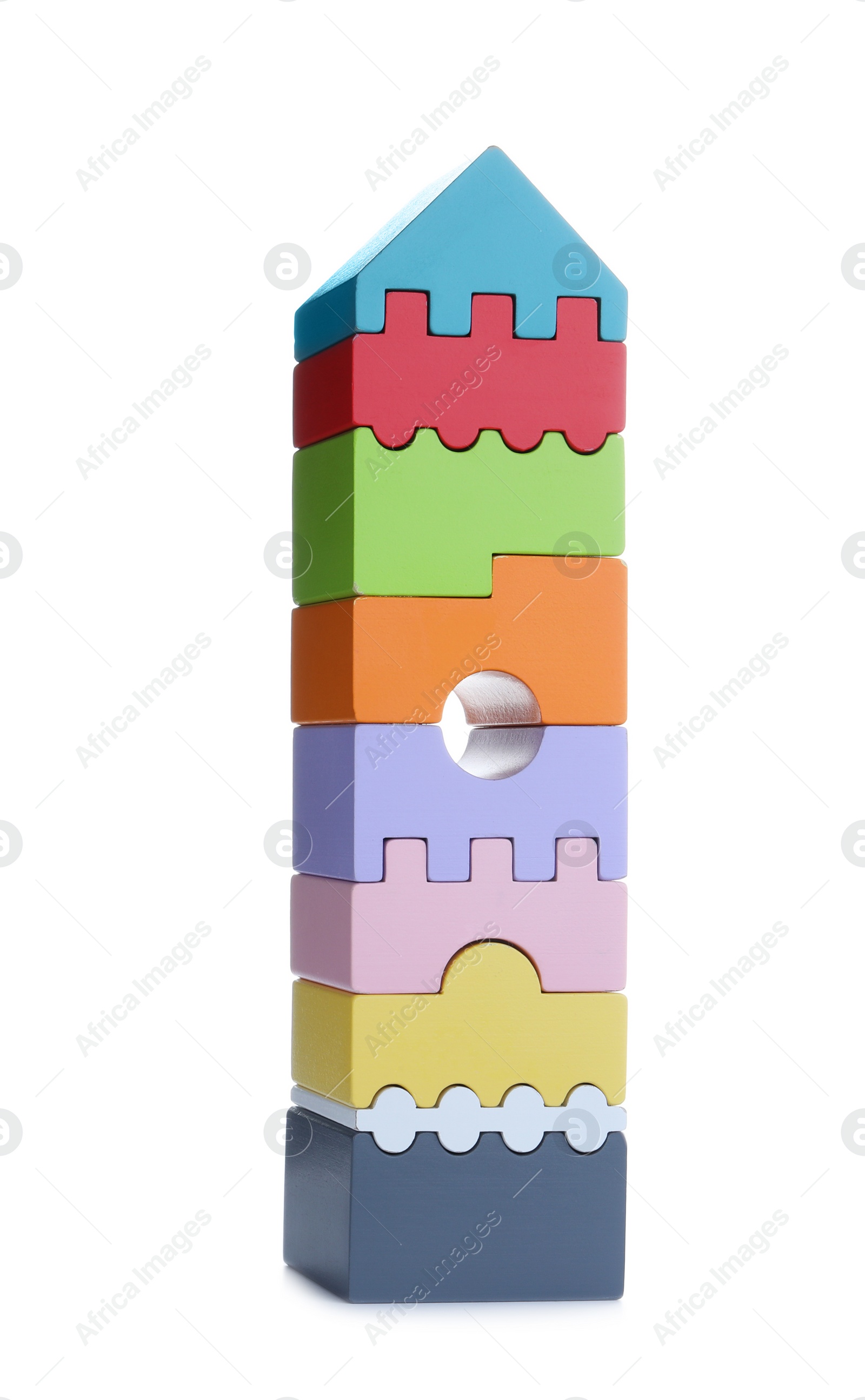 Photo of Colorful toy tower made of blocks isolated on white