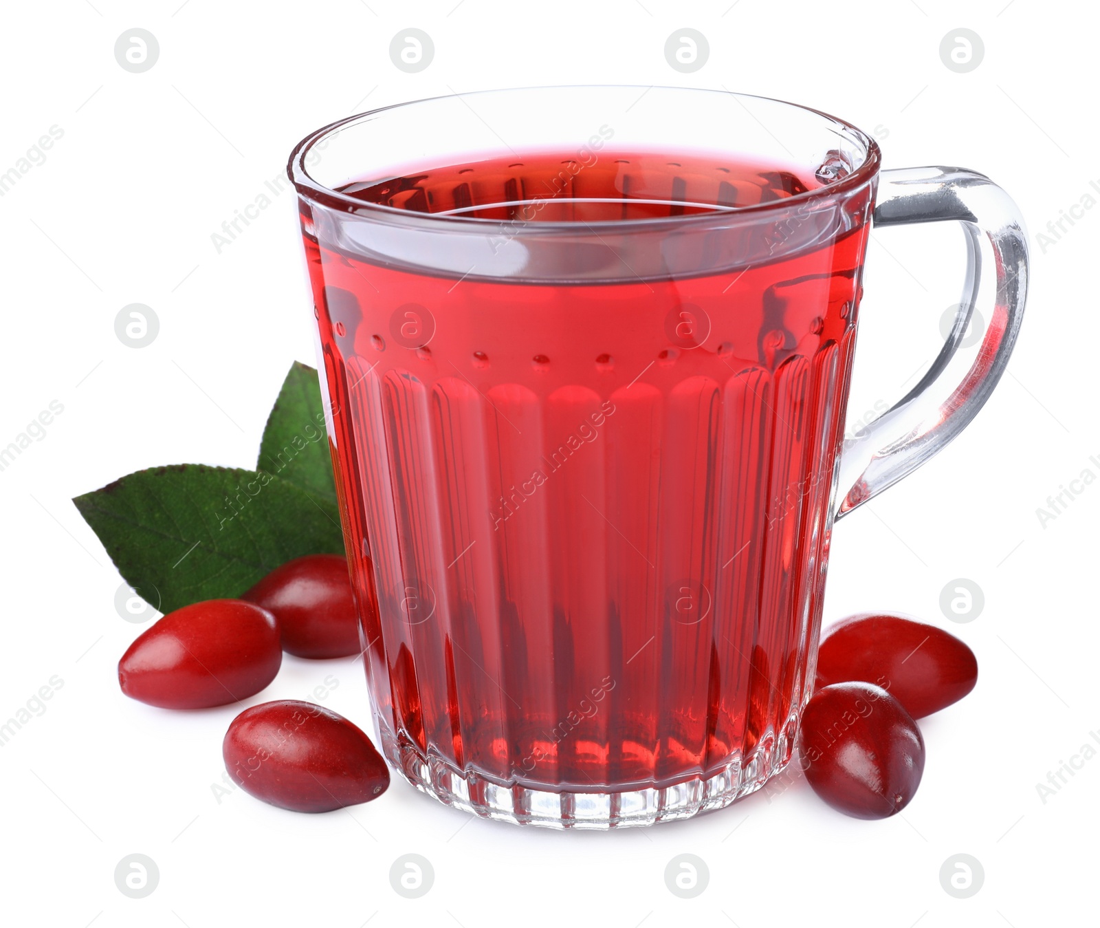 Photo of Glass cup of fresh dogwood tea, berries and leaves on white background