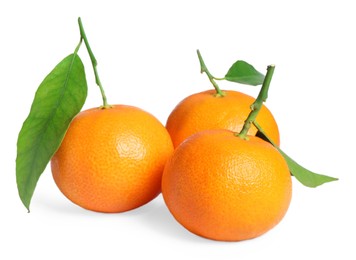 Fresh ripe juicy tangerines with green leaves isolated on white