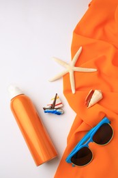 Photo of Flat lay composition with bottle of sunscreen on white background