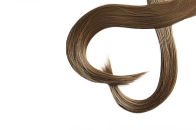 Photo of Beautiful strands of brown hair on white background, top view. Hairdresser service