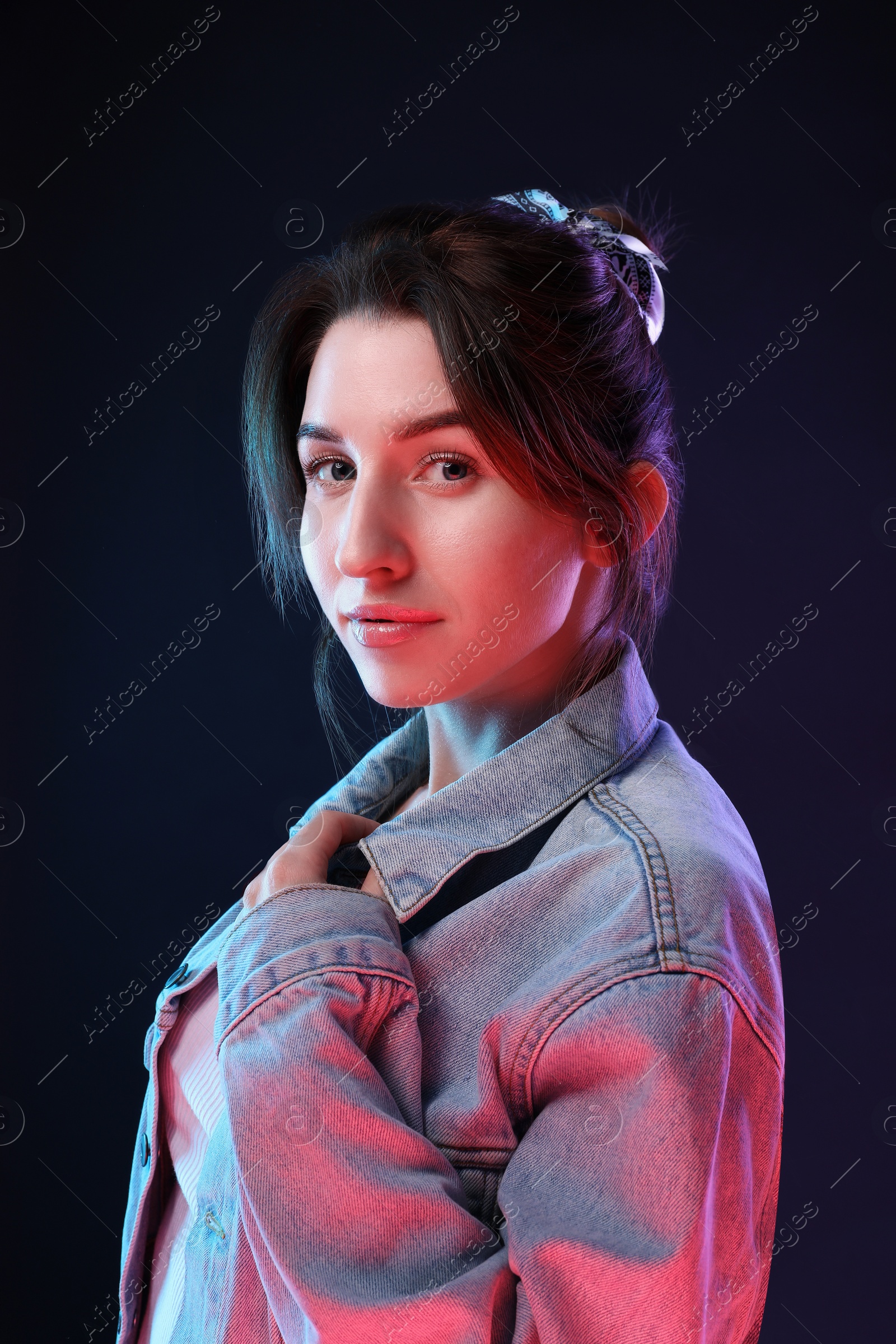 Photo of Portrait of beautiful young woman on color background