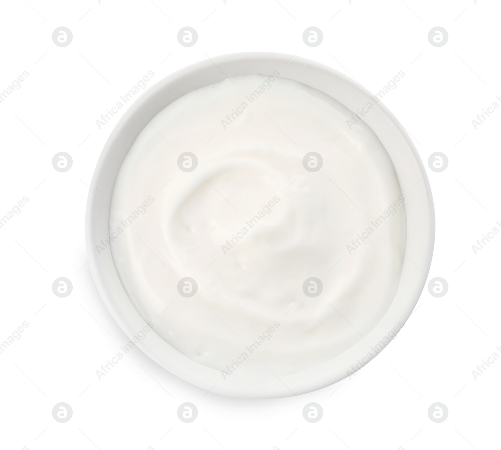 Photo of Bowl with delicious organic yogurt isolated on white, top view