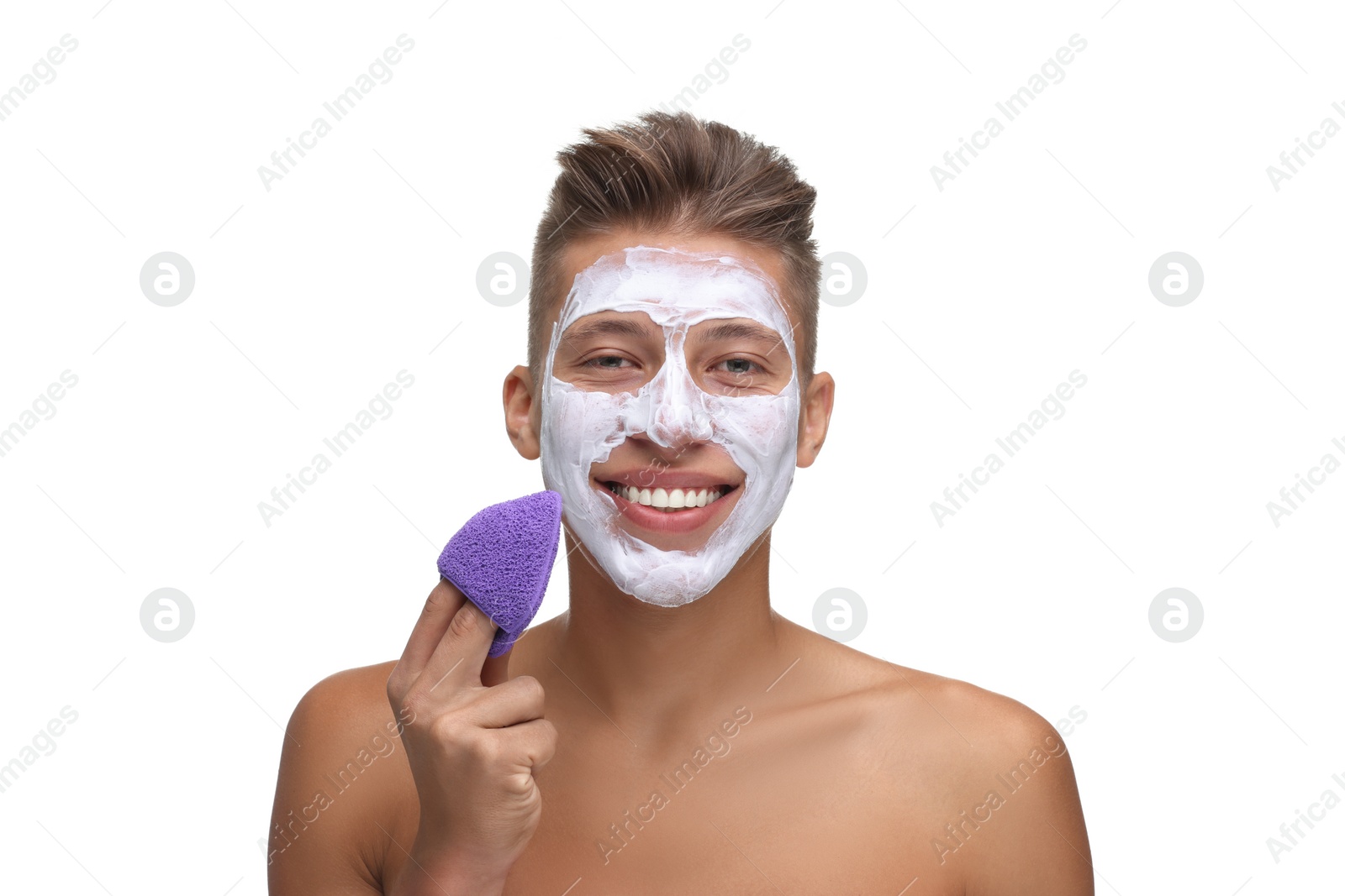 Photo of Happy young man with face mask and sponge on white background