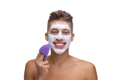 Photo of Happy young man with face mask and sponge on white background