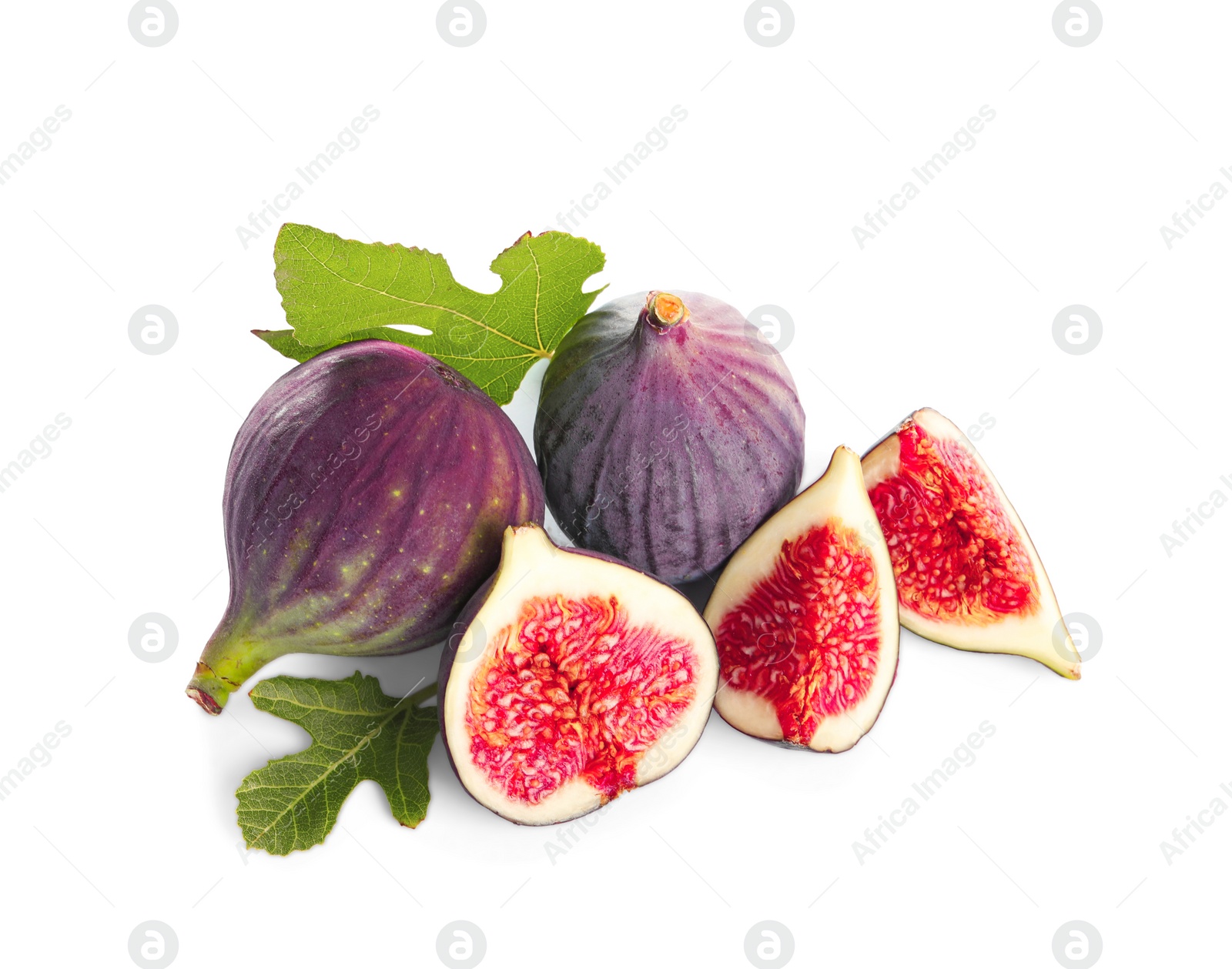 Photo of Whole and cut purple figs on white background