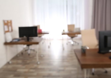 Photo of Modern brightly lit office with bokeh effect