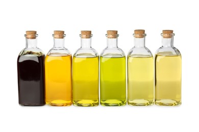 Vegetable fats. Bottles of different cooking oils isolated on white
