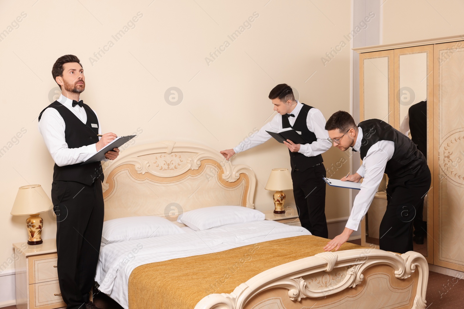 Photo of Group of people attending professional butler courses in hotel