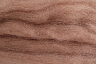 Photo of Soft felting wool as background, closeup view