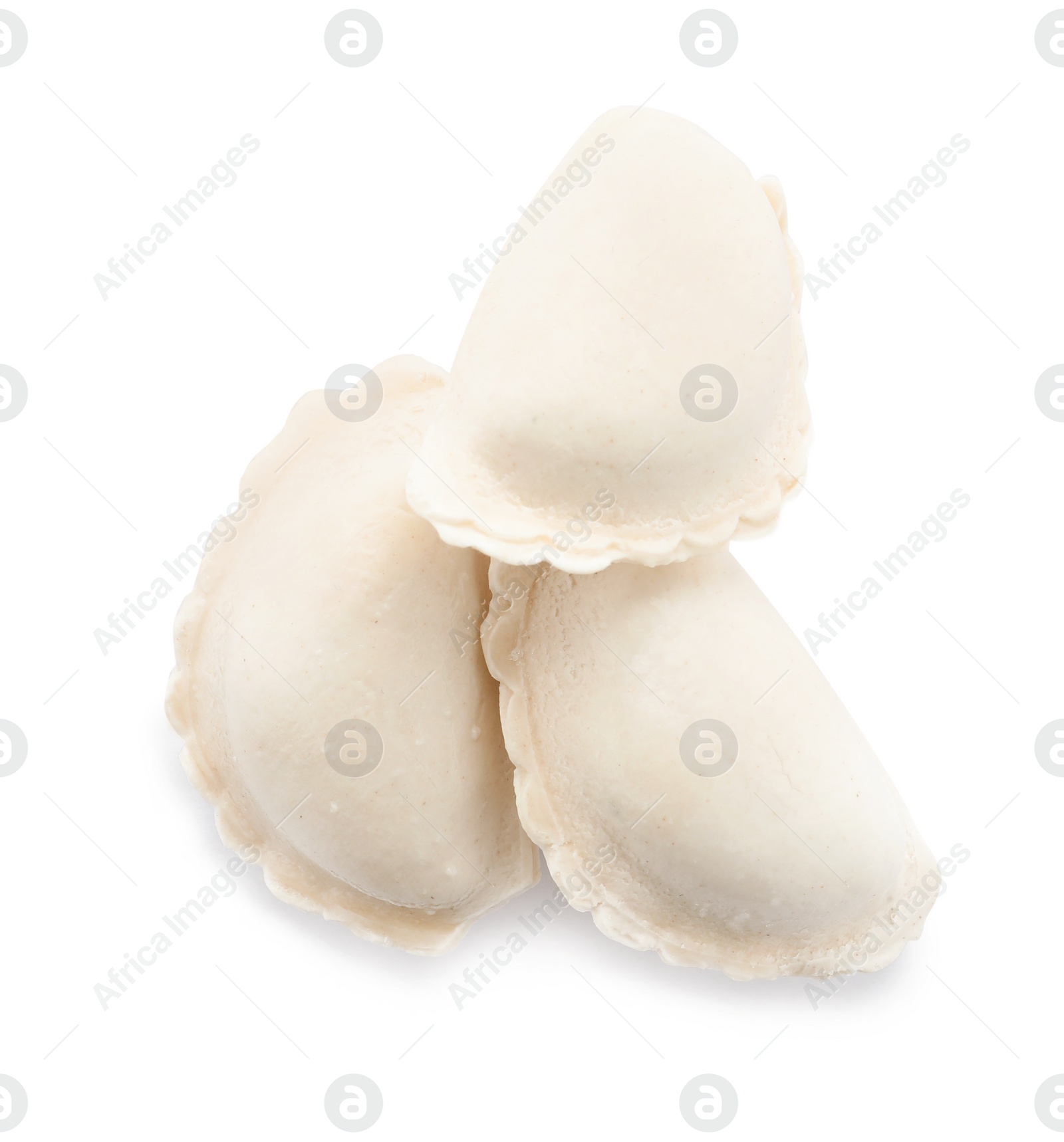 Photo of Tasty raw dumplings on white background, top view