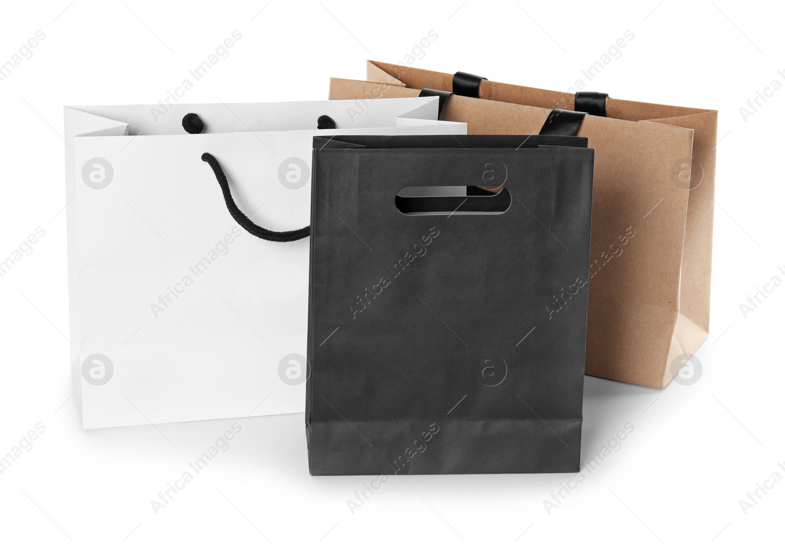 Photo of Paper shopping bags isolated on white. Mock up for design