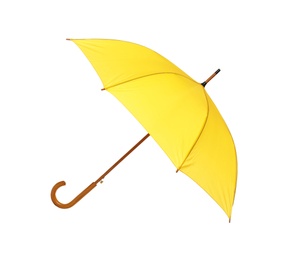 Photo of Modern opened yellow umbrella isolated on white