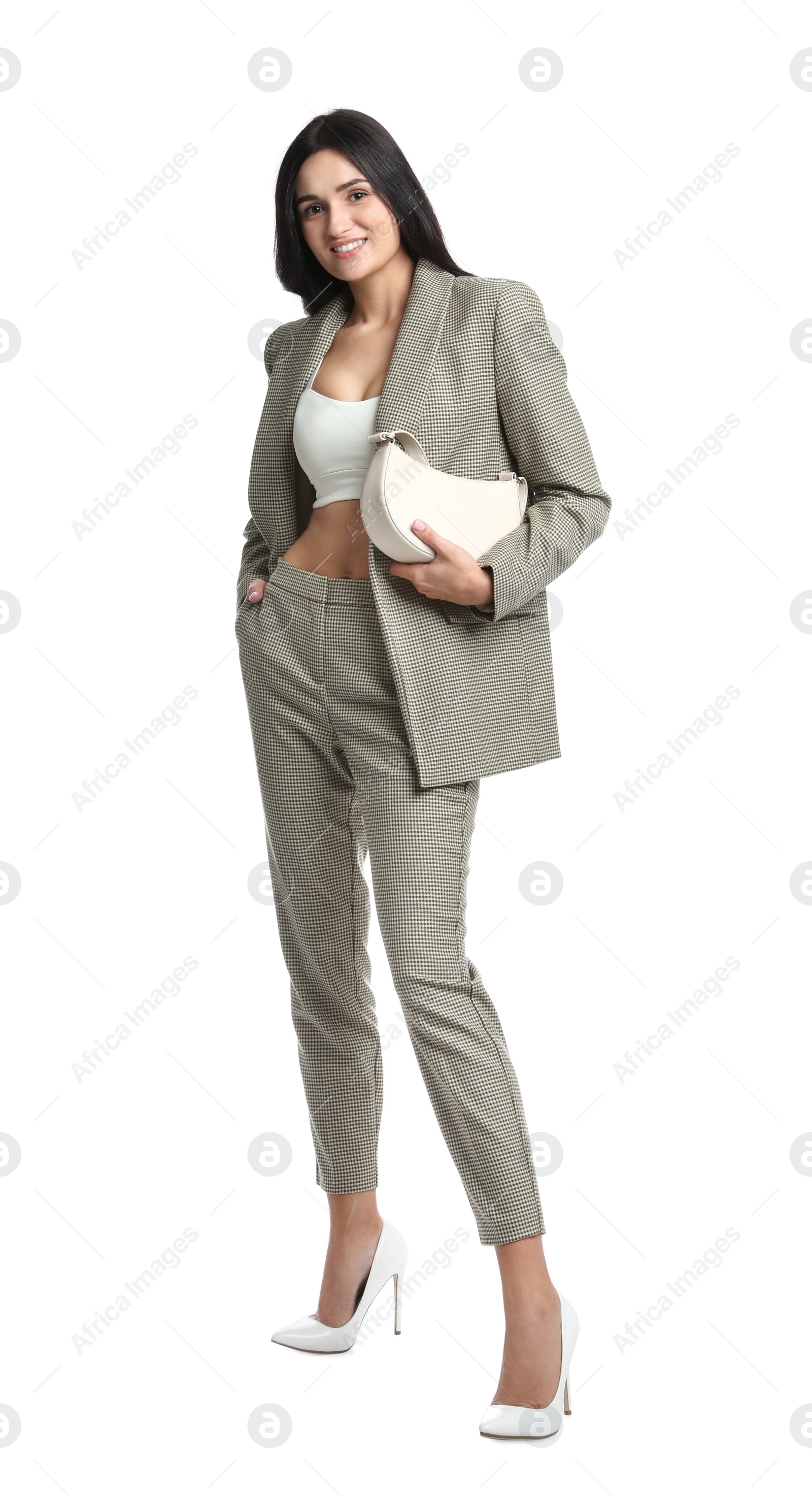 Photo of Full length portrait of beautiful woman with bag in formal suit on white background