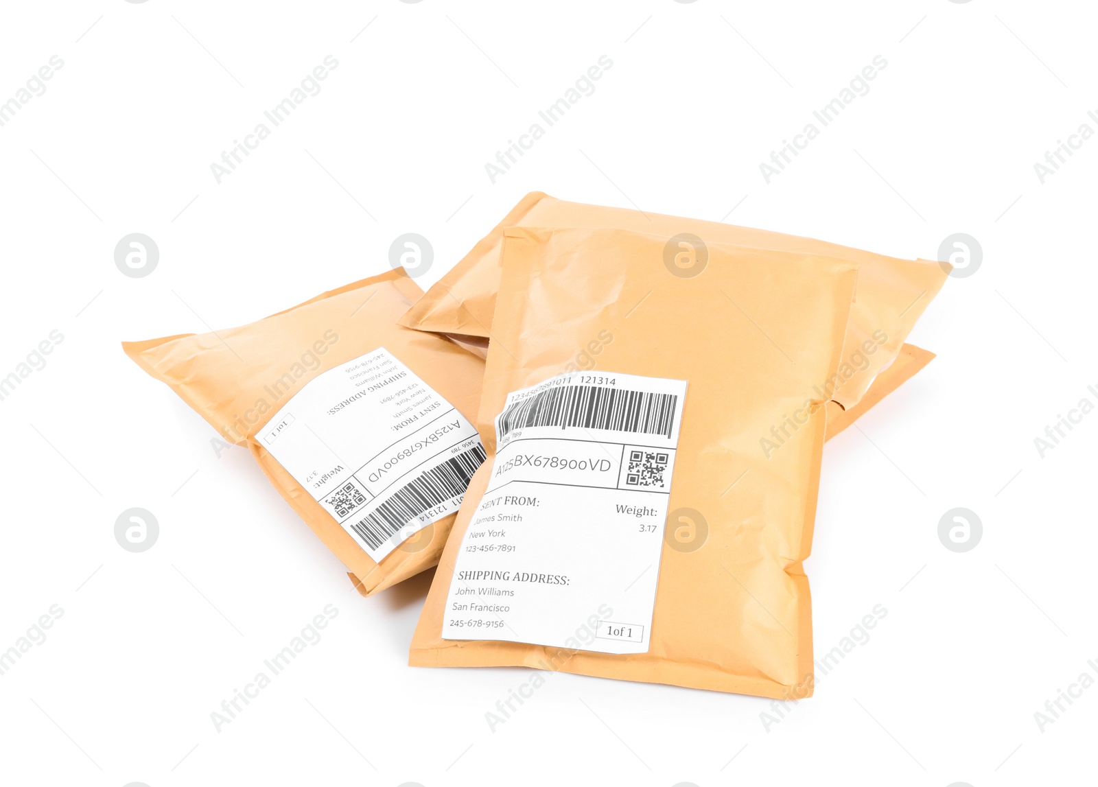 Photo of Padded envelopes on white background. Parcel delivery