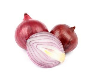 Fresh whole and cut red onions on white background