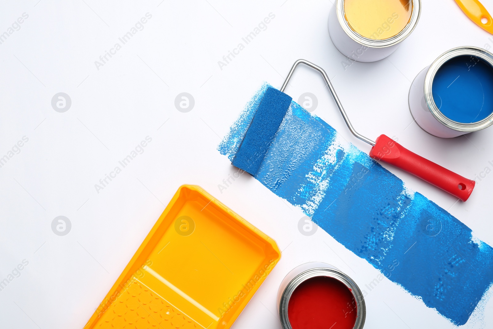 Photo of Composition with paint cans and space for text on white background