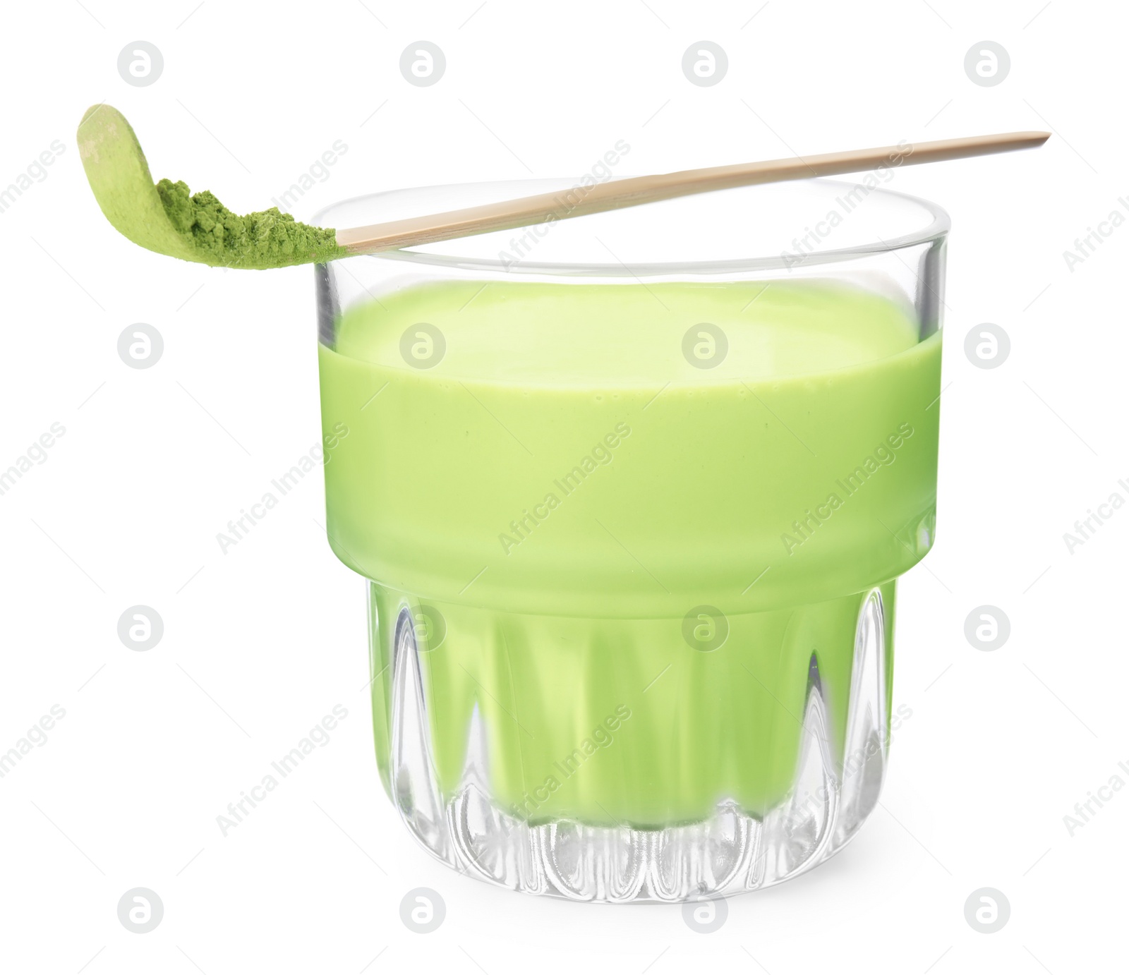 Photo of Glass of tasty matcha smoothie and bamboo spoon with powder isolated on white