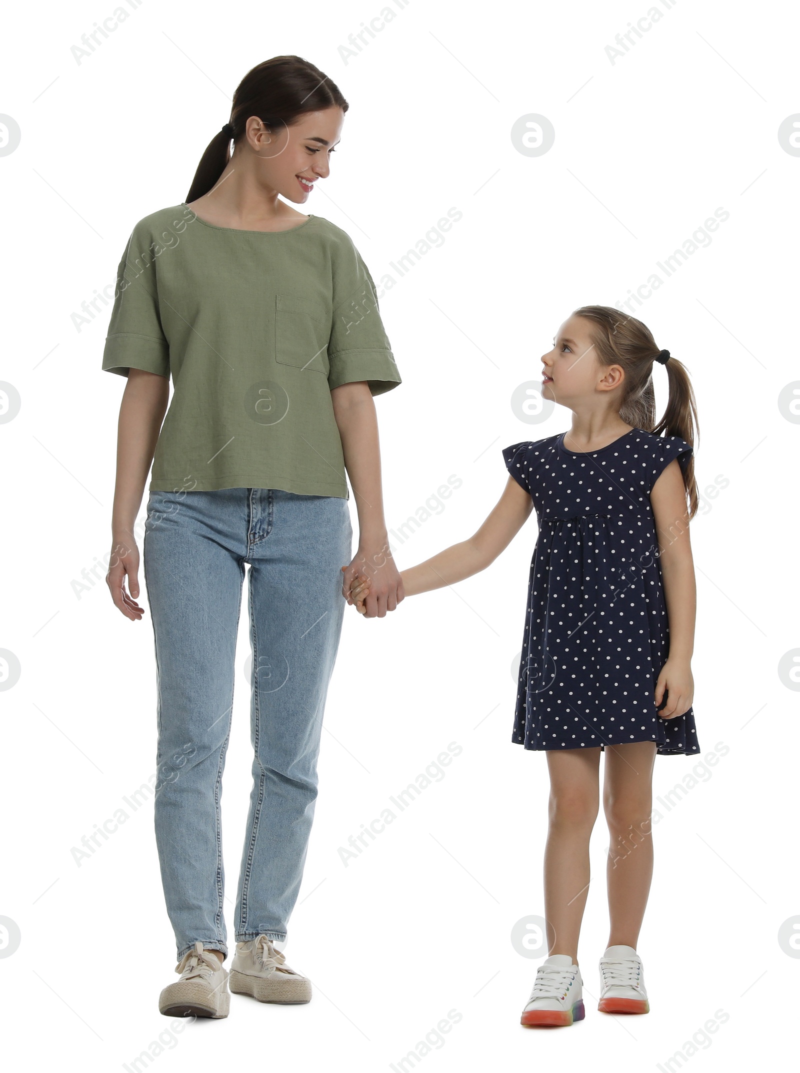 Photo of Little girl with her mother on white background