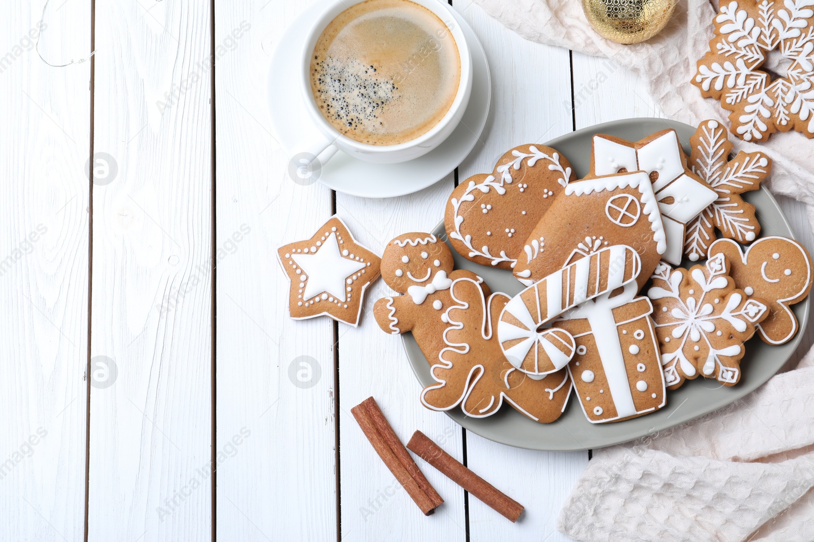 Photo of Delicious Christmas cookies on white wooden table, flat lay. Space for text