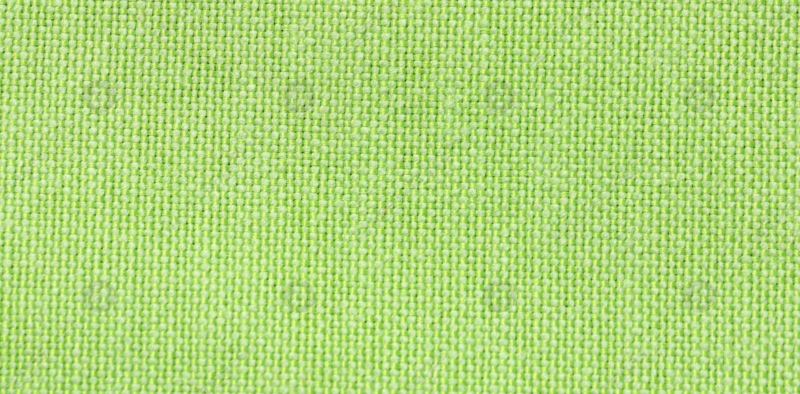 Photo of Texture of green fabric as background, top view