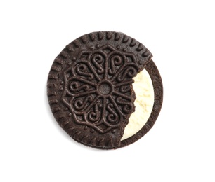 Tasty chocolate cookie with cream on white background, top view