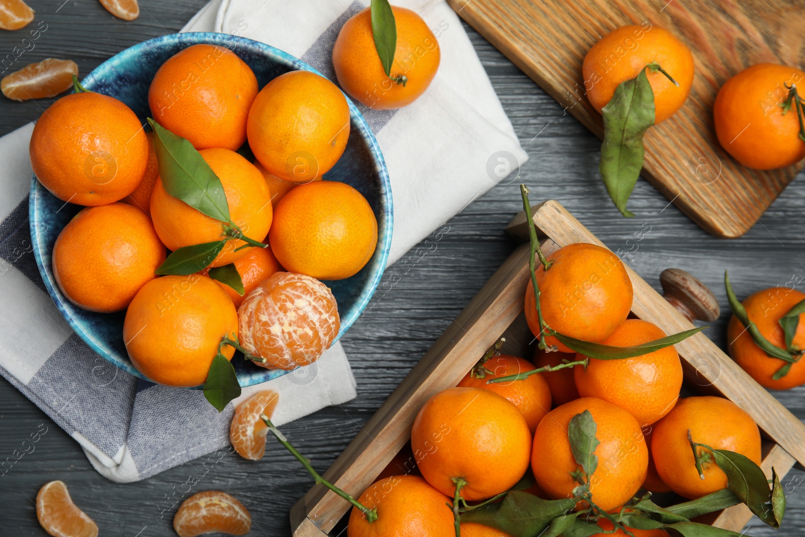 Photo of Flat lay composition with fresh ripe tangerines on wooden background