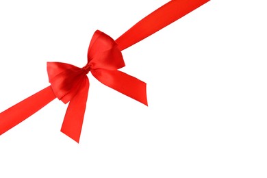 Photo of Red ribbon with bow on white background. Festive decoration