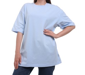 Woman in stylish light blue t-shirt on white background, closeup