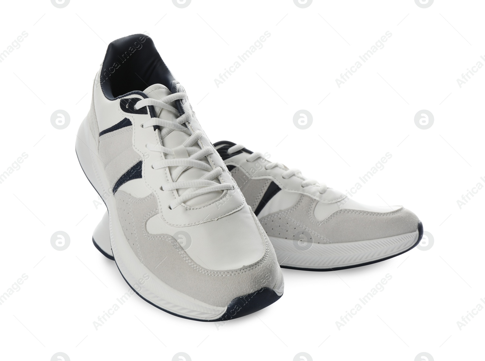 Photo of Pair of stylish sneakers on white background