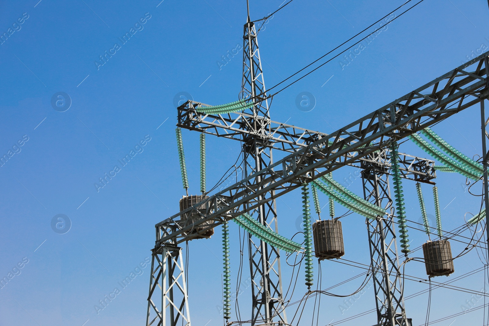 Photo of Modern electrical substation on sunny day, low angle view