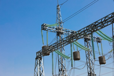 Photo of Modern electrical substation on sunny day, low angle view