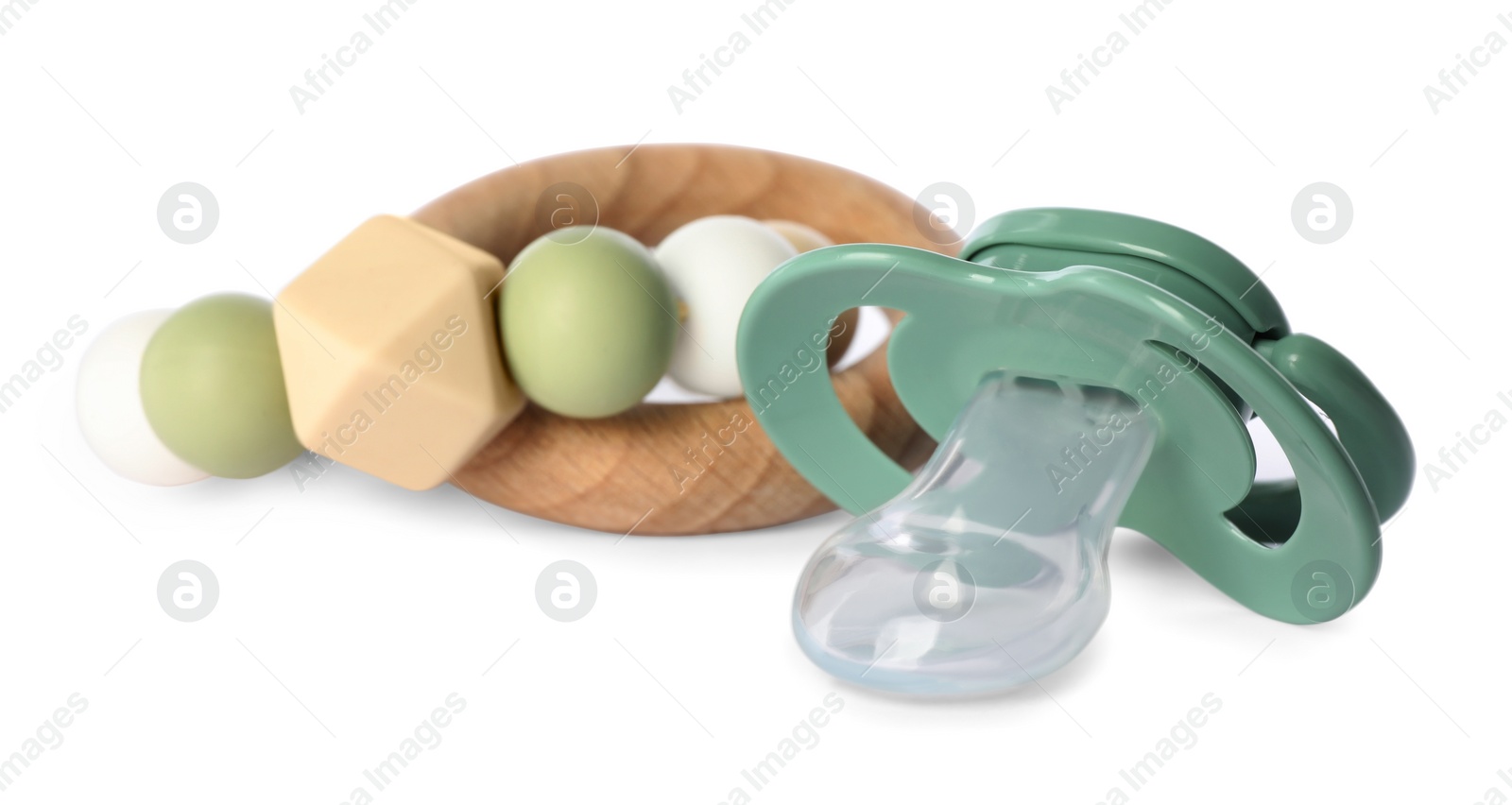 Photo of Toys and baby pacifier isolated on white