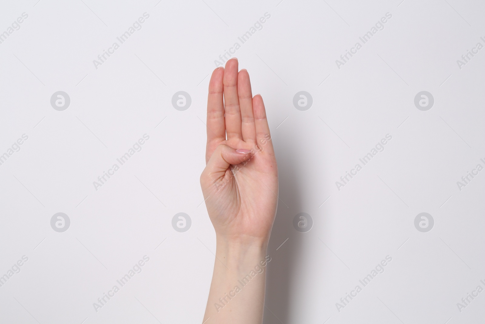 Photo of Woman showing open palm on white background, closeup