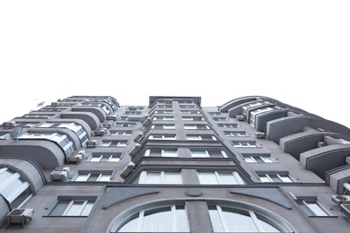 Modern office building with tinted windows against sky