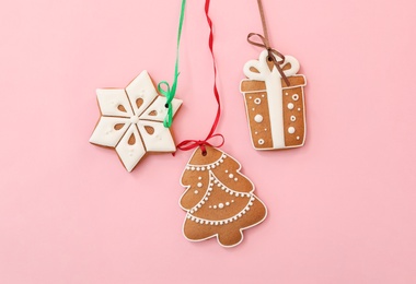 Photo of Different delicious Christmas cookies on pink background, flat lay