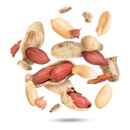 Image of Peanuts and crushed pods in air on white background