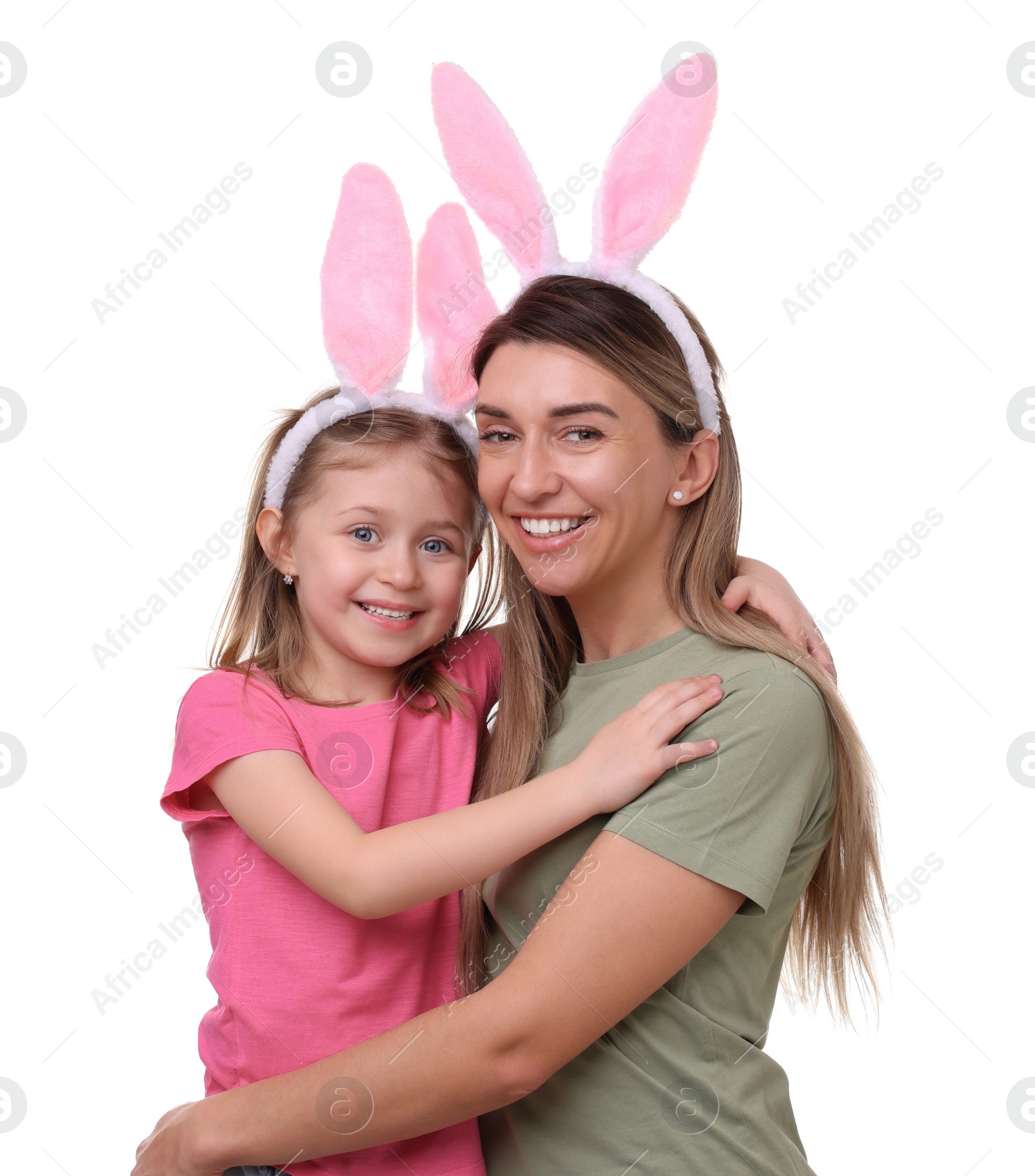 Photo of Easter celebration. Mother and her cute daughter with bunny ears isolated on white