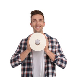 Photo of Young man holding toilet paper roll on white background