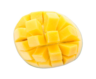 Photo of Half of ripe mango cut into cubes isolated on white, top view