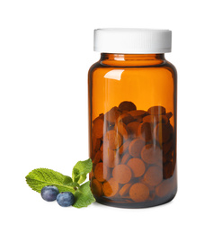 Photo of Bottle with vitamin pills, mint and blueberries on white background