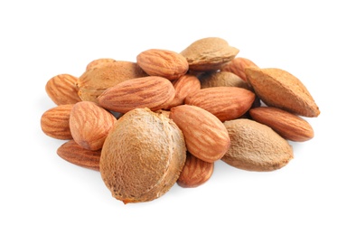 Photo of Organic dried apricot kernels on white background