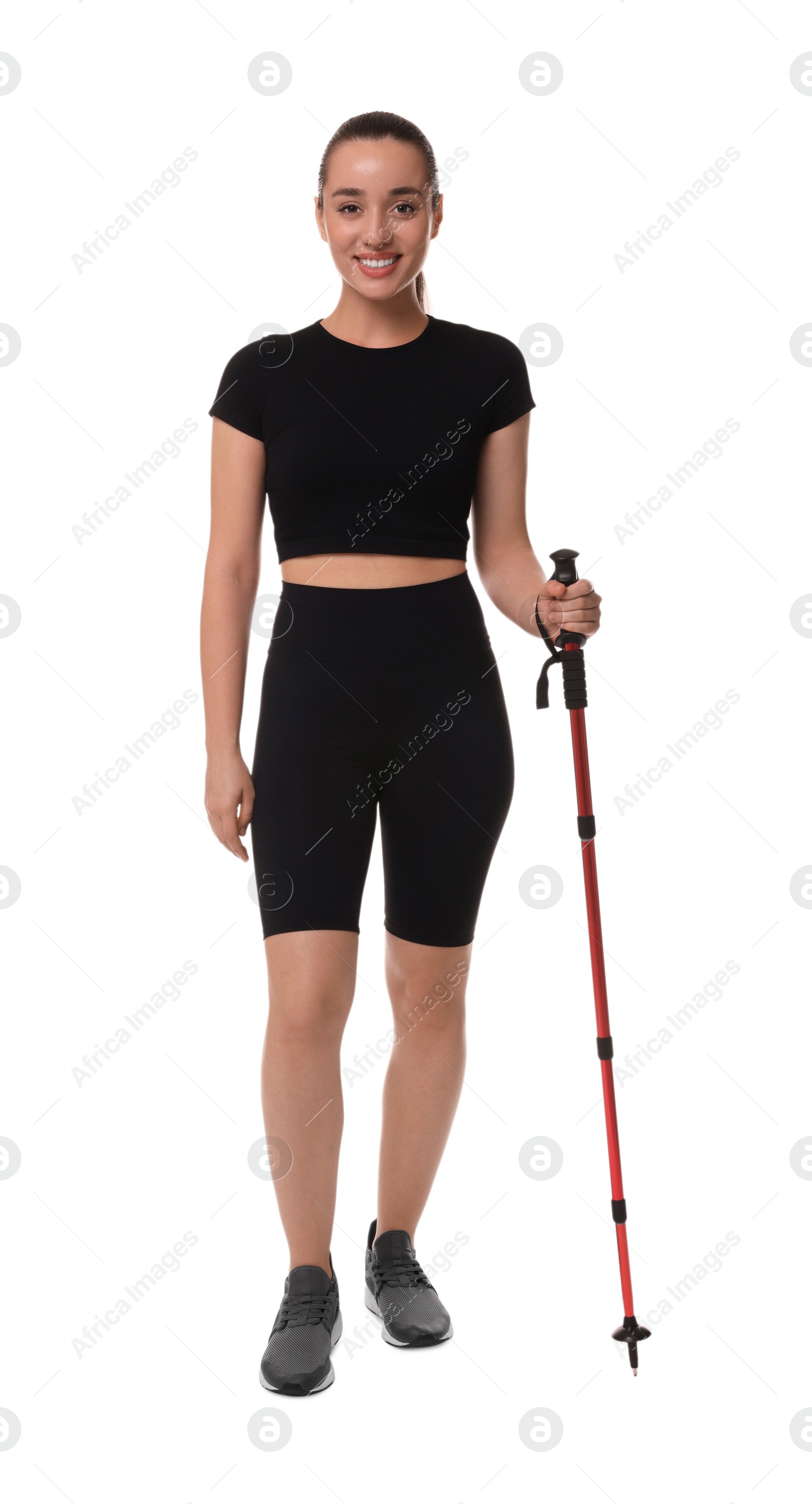 Photo of Woman with pole for Nordic walking isolated on white