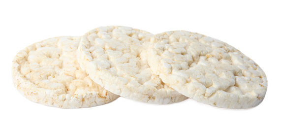 Photo of Puffed rice cakes isolated on white. Healthy snack