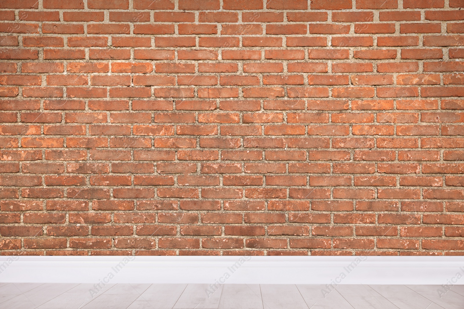 Image of Room with brick wall and wooden floor