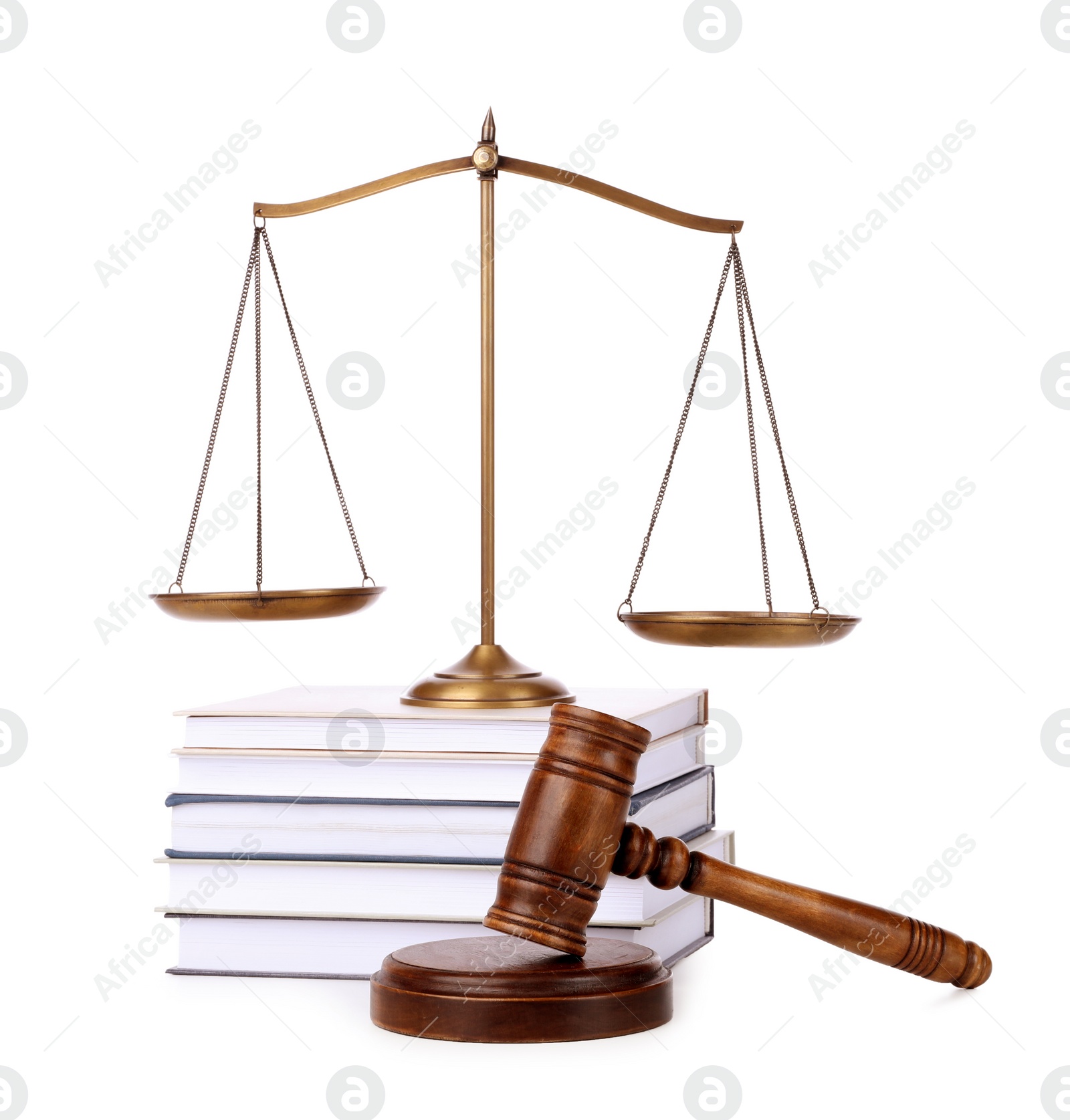 Photo of Wooden gavel, books and scales of justice on white background