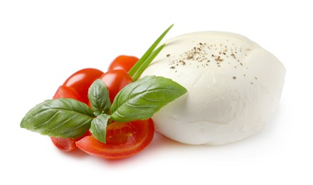 Delicious mozzarella with tomatoes and basil leaves on white background