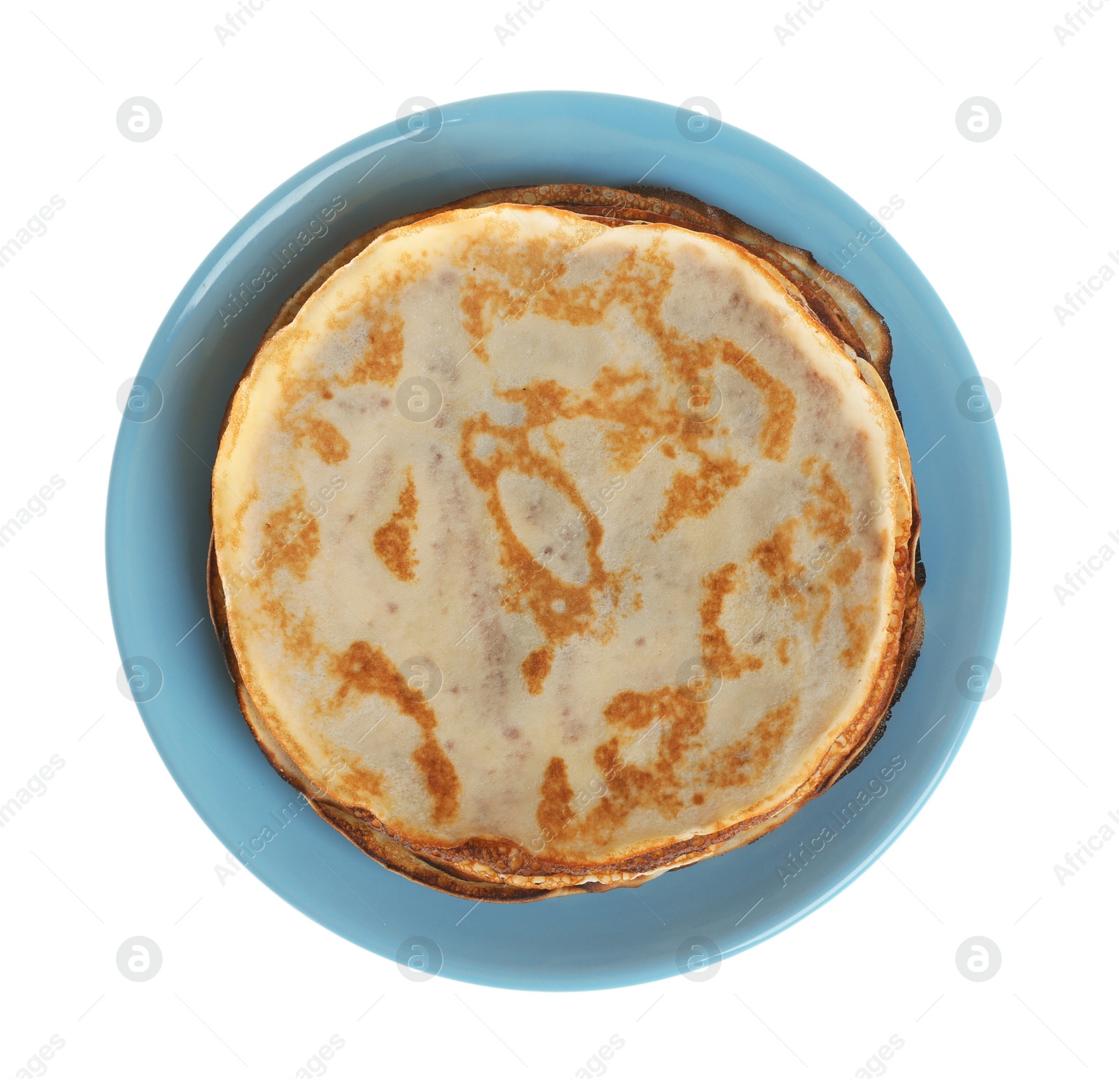 Photo of Stack of delicious crepes on plate against white background, top view